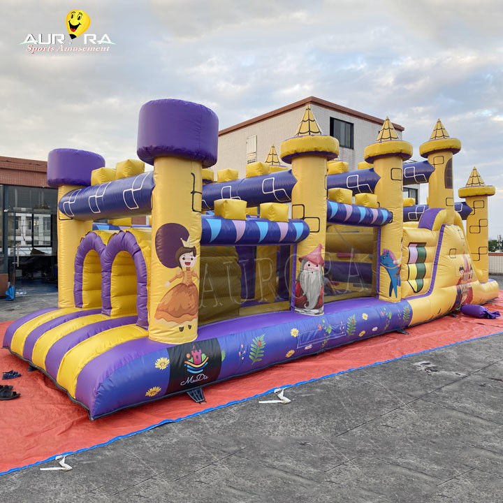 Corso di ostacoli gonfiabile commerciale con scivolo impermeabile colore giallo viola